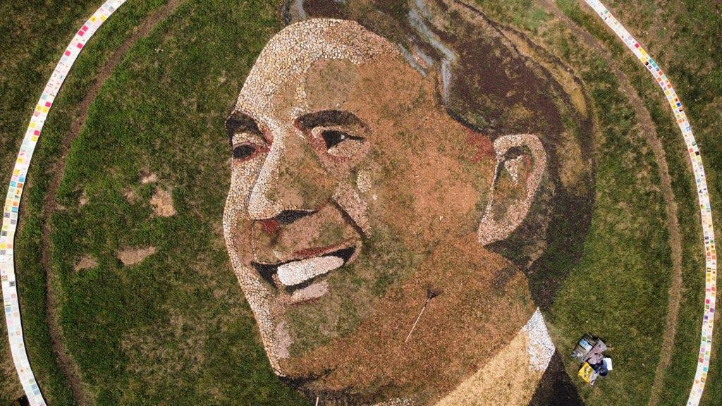 Image of person made into the grass