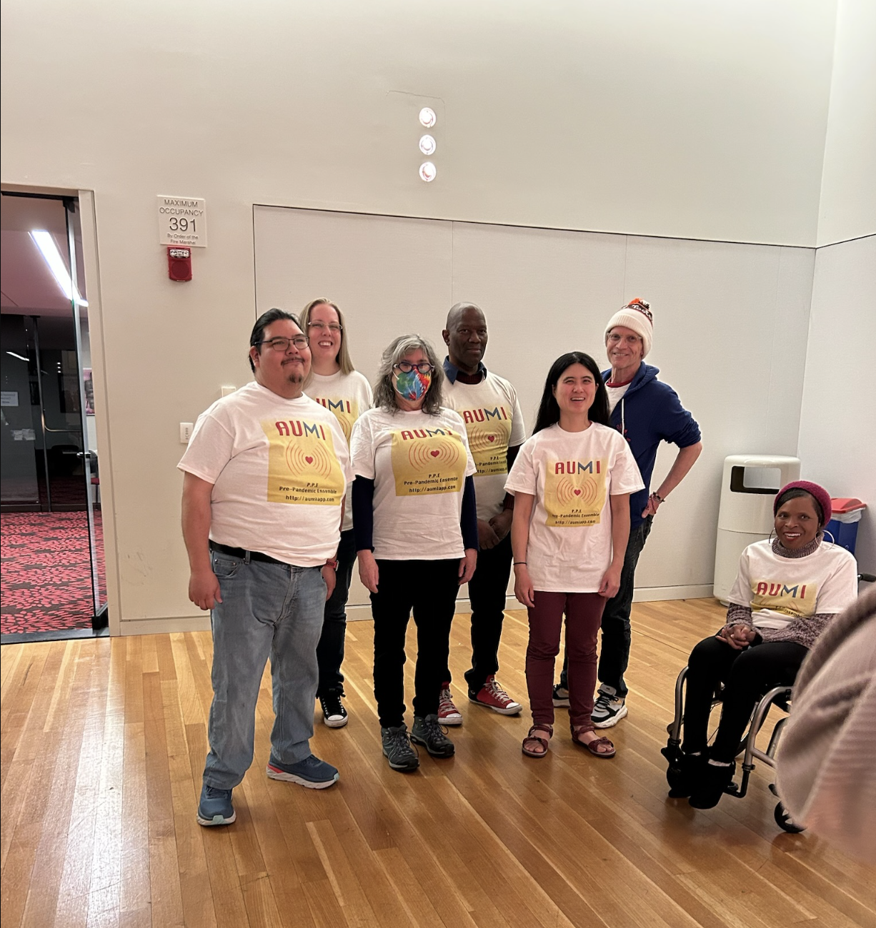 AUMI musicians pose for a photo at the Lied Center before their performance