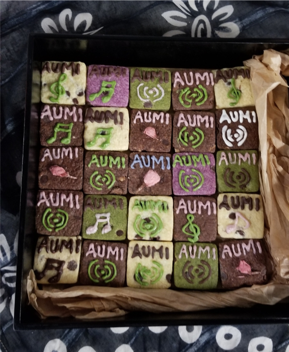 Bimi Bakery cookies decorated as AUMI themed sitting in a tray